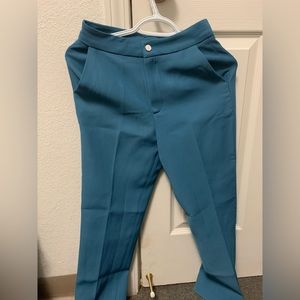 This is dark green/blue suit